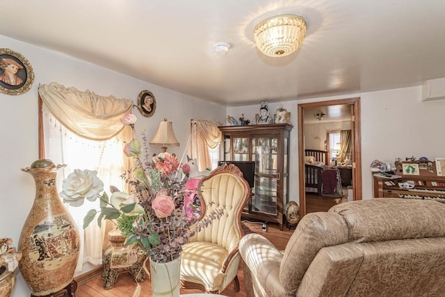 43 Huntington St, Brockton, MA 02301 - living room featuring wood finished floors and a chandelier