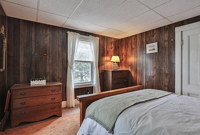 32 Carter St, Hudson, MA 01749 - carpeted bedroom featuring wooden walls and a paneled ceiling