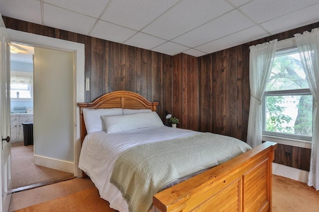 32 Carter St, Hudson, MA 01749 - bedroom featuring light carpet, a paneled ceiling, wooden walls, and multiple windows