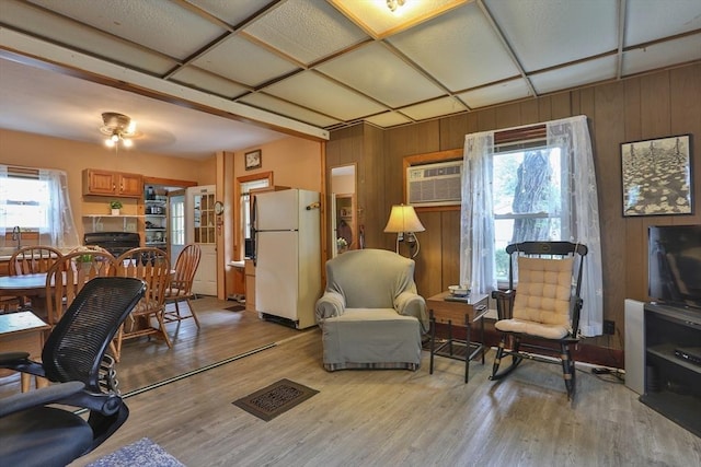 32 Carter St, Hudson, MA 01749 - office space featuring plenty of natural light, an AC wall unit, light wood-style floors, and wooden walls
