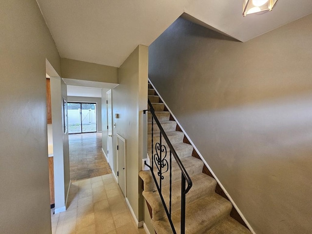 403 Windsor Dr Unit 0, Framingham, MA 01701 - staircase featuring baseboards