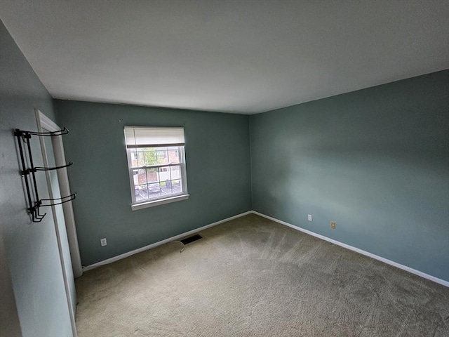 403 Windsor Dr Unit 0, Framingham, MA 01701 - carpeted empty room with baseboards