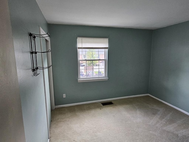 403 Windsor Dr Unit 0, Framingham, MA 01701 - carpeted spare room with baseboards