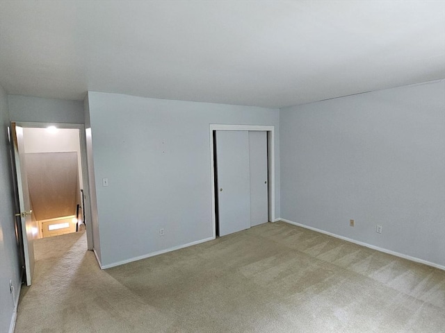403 Windsor Dr Unit 0, Framingham, MA 01701 - unfurnished bedroom featuring light colored carpet and a closet