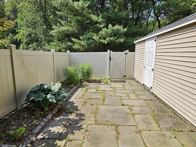 403 Windsor Dr Unit 0, Framingham, MA 01701 - view of yard featuring a gate and a patio area