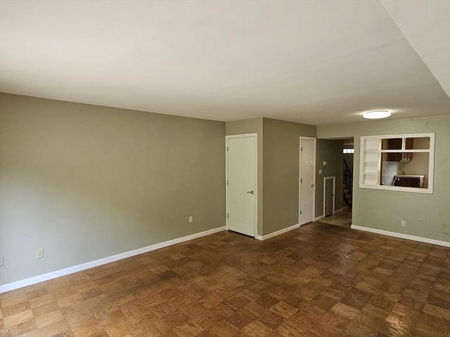 403 Windsor Dr Unit 0, Framingham, MA 01701 - empty room with baseboards