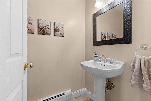 bathroom featuring baseboards and tile patterned floors