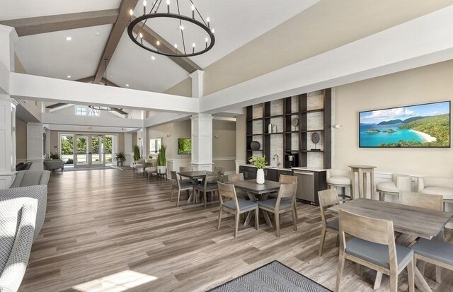 2 Codman Way Unit 305, Westborough, MA 01581 - dining area with decorative columns, high vaulted ceiling, beam ceiling, light wood-type flooring, and recessed lighting