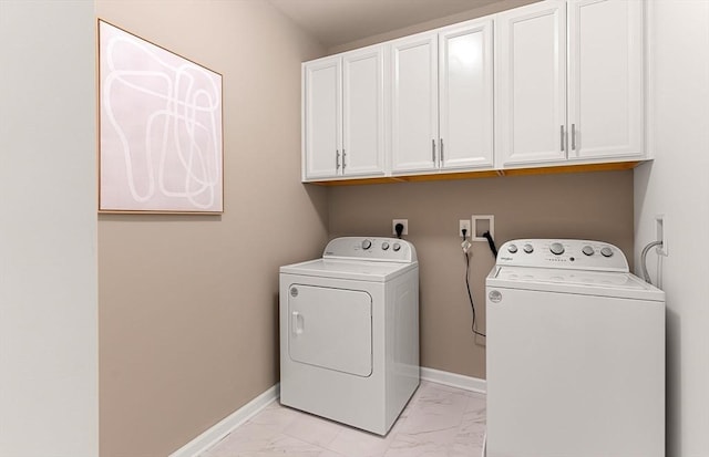 2 Codman Way Unit 305, Westborough, MA 01581 - laundry room with cabinet space, separate washer and dryer, light marble finish flooring, and baseboards