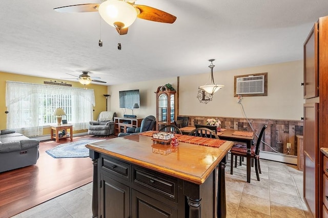 68 Victoria Ave, Athol, MA 01331 - kitchen with a ceiling fan, a wall mounted air conditioner, healthy amount of natural light, and open floor plan