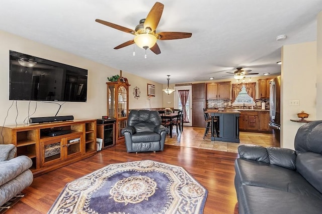 68 Victoria Ave, Athol, MA 01331 - living area featuring a ceiling fan and light wood finished floors
