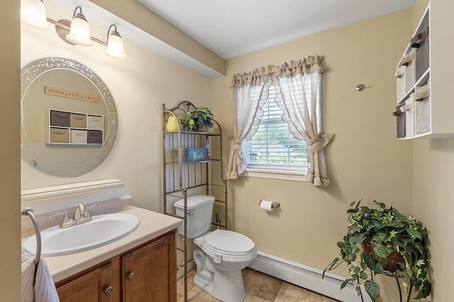 68 Victoria Ave, Athol, MA 01331 - bathroom with baseboard heating, vanity, and tile patterned flooring