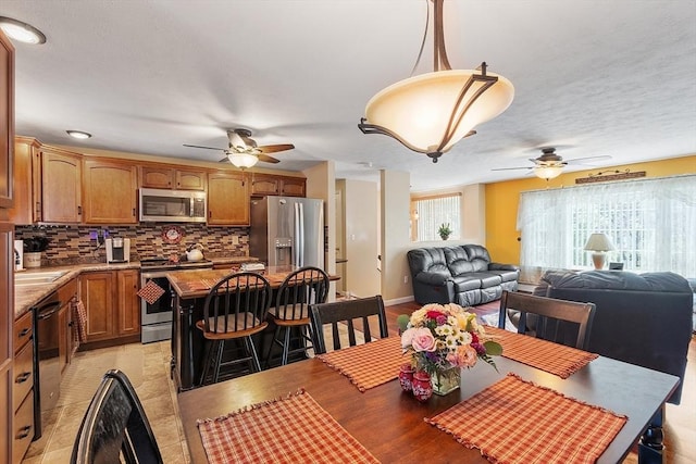 68 Victoria Ave, Athol, MA 01331 - dining room with a ceiling fan and light wood-style floors
