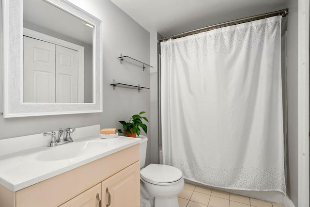 247 Ash St Unit 3, Waltham, MA 02453 - full bathroom with vanity, toilet, tile patterned flooring, and a shower with curtain