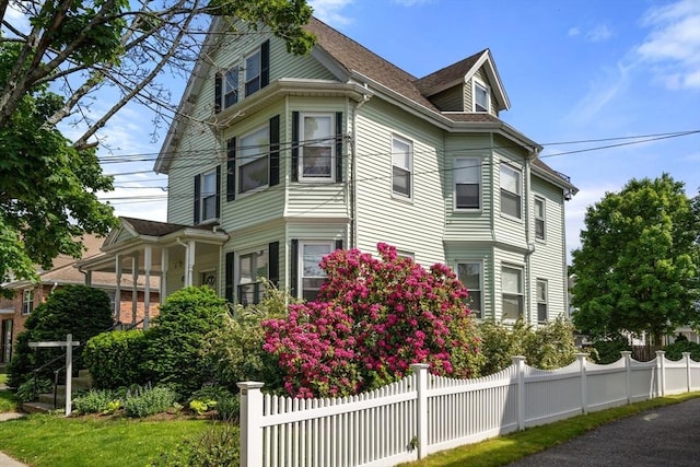 247 Ash St Unit 3, Waltham, MA 02453 - view of property exterior with a shingled roof
