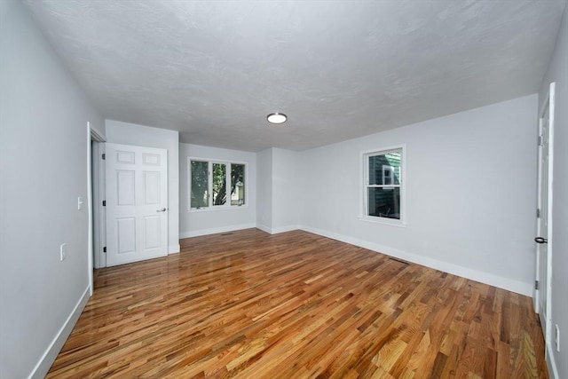 121 Horton St, Fall River, MA 02723 - spare room with wood finished floors and baseboards