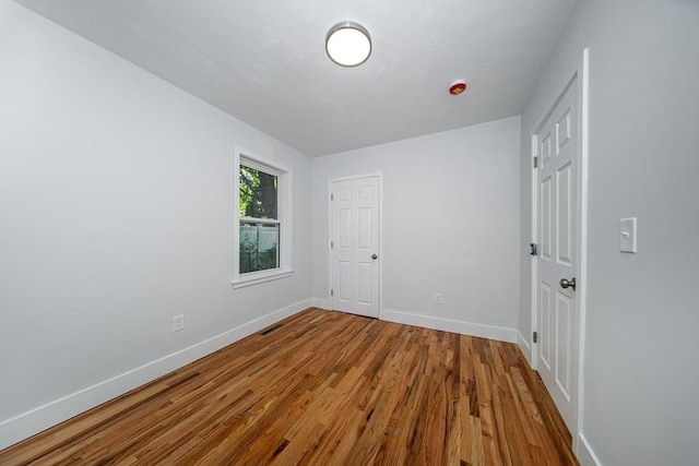121 Horton St, Fall River, MA 02723 - spare room with baseboards and wood finished floors