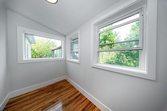 121 Horton St, Fall River, MA 02723 - unfurnished room with lofted ceiling, dark wood-type flooring, and baseboards