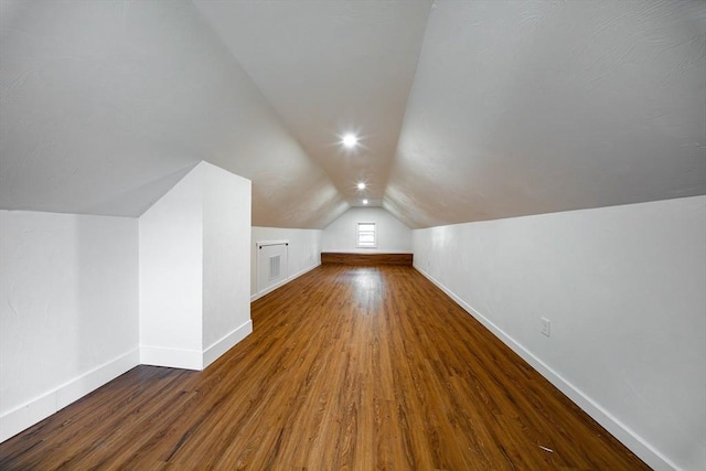121 Horton St, Fall River, MA 02723 - bonus room with vaulted ceiling, baseboards, and wood finished floors