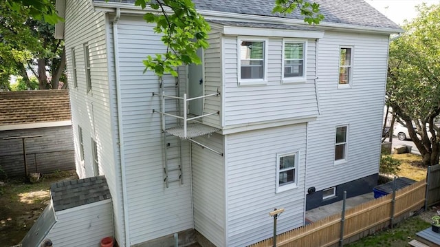 121 Horton St, Fall River, MA 02723 - back of house with a shingled roof