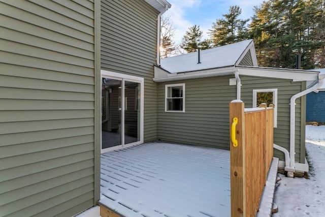 view of snow covered deck