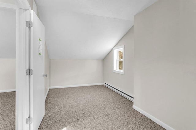 bonus room with carpet floors, a baseboard radiator, and lofted ceiling