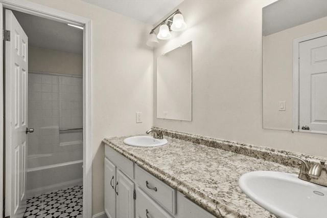 bathroom featuring vanity and shower / bath combination