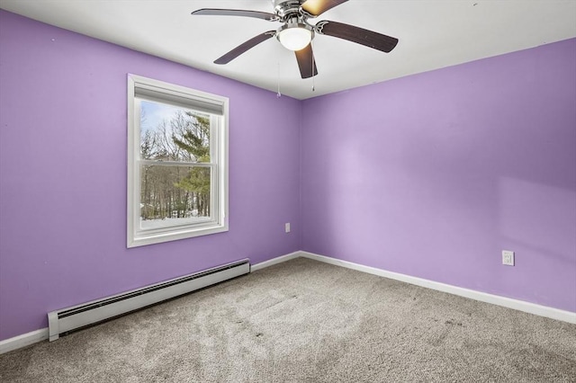 spare room with ceiling fan, carpet flooring, and baseboard heating