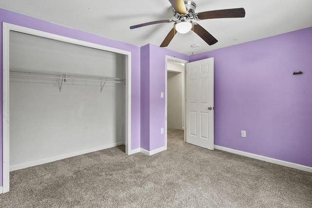 unfurnished bedroom featuring a closet, ceiling fan, and carpet flooring