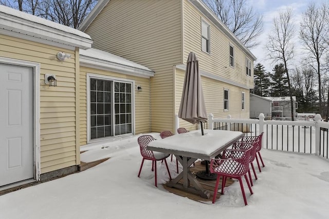 view of snow covered patio