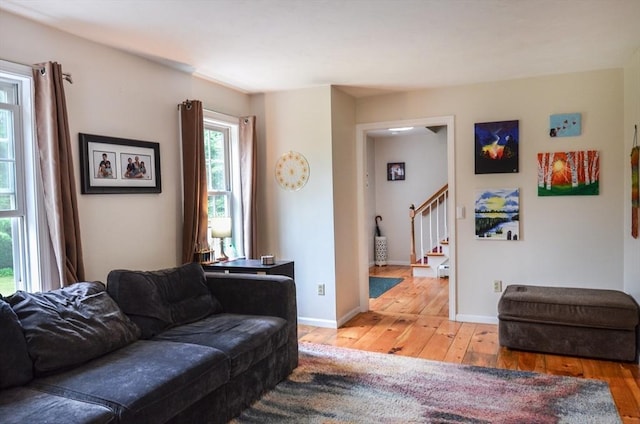 169 Lyman Rd, Berlin, MA 01503 - living area with light wood finished floors and stairs