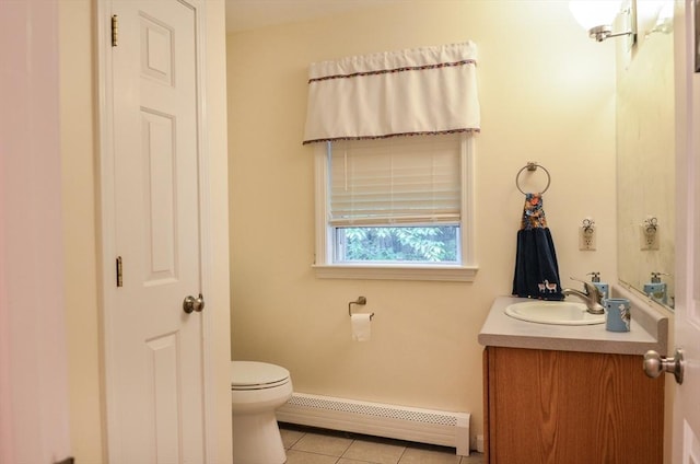 169 Lyman Rd, Berlin, MA 01503 - half bathroom with a baseboard radiator, tile patterned flooring, and vanity