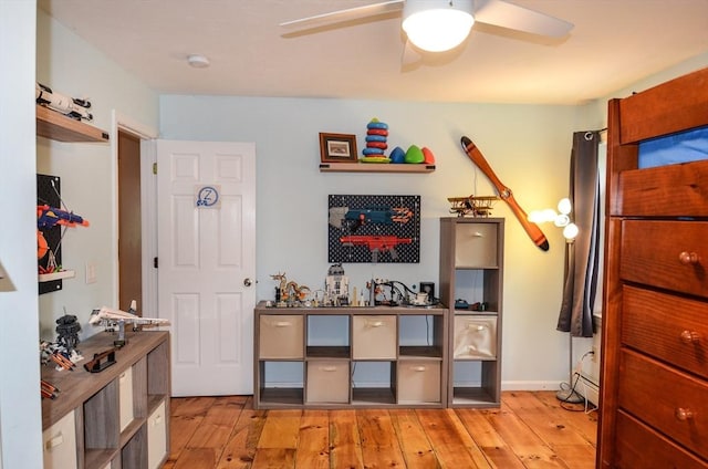 169 Lyman Rd, Berlin, MA 01503 - bedroom with light wood-style floors, baseboard heating, a bar, and a ceiling fan