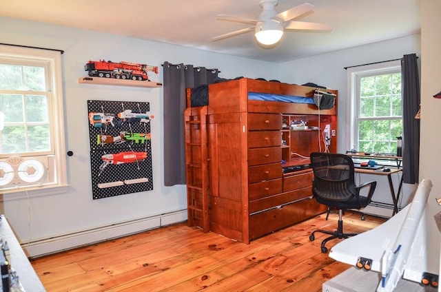 169 Lyman Rd, Berlin, MA 01503 - office with baseboard heating, light wood-type flooring, healthy amount of natural light, and ceiling fan