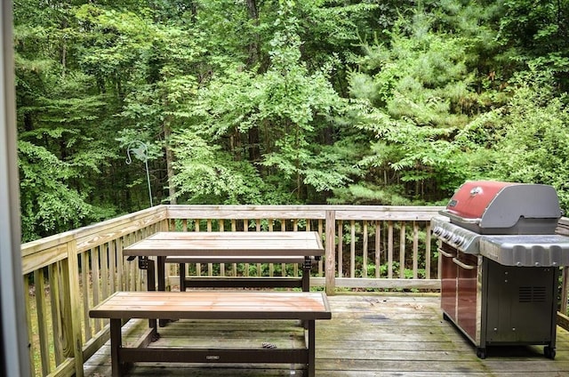 169 Lyman Rd, Berlin, MA 01503 - wooden terrace featuring area for grilling and a forest view