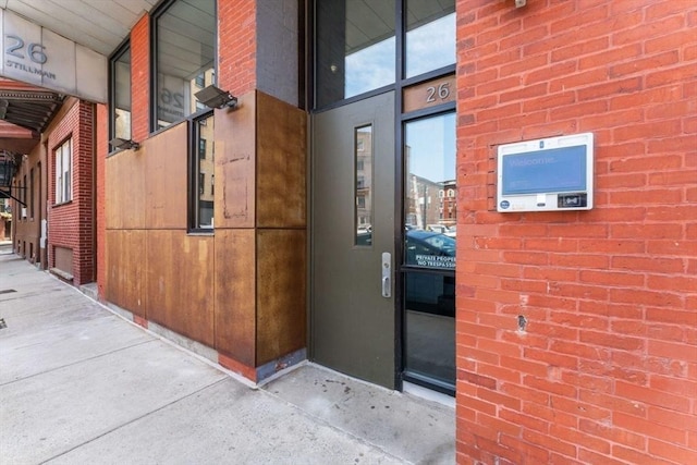 26 Stillman St Unit 4-5, Boston, MA 02113 - doorway to property featuring brick siding