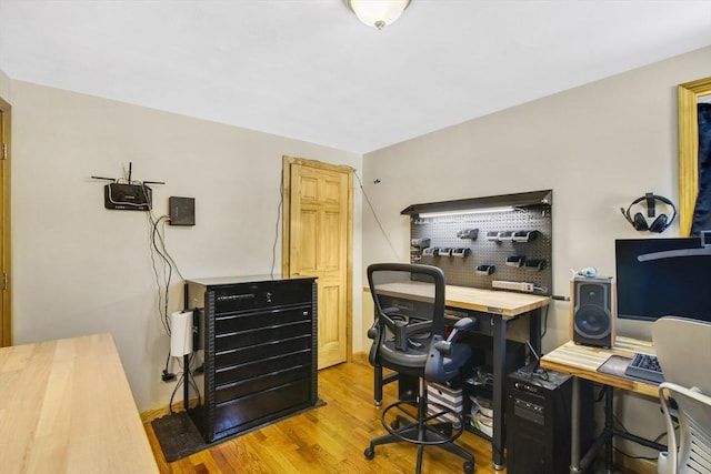 office area featuring light hardwood / wood-style floors