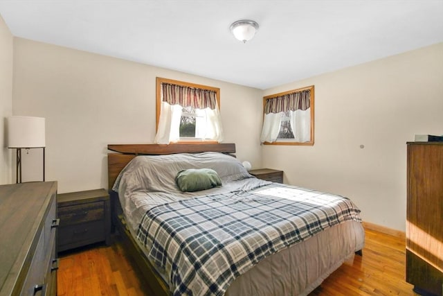 bedroom featuring hardwood / wood-style flooring