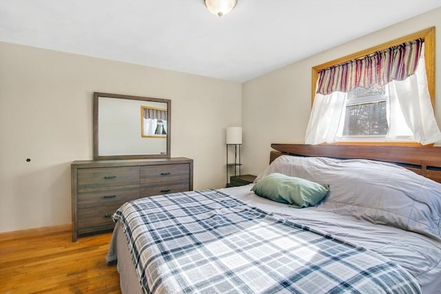 bedroom featuring light hardwood / wood-style floors