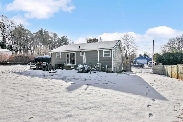 view of snow covered house