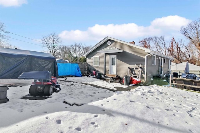 view of snow covered property