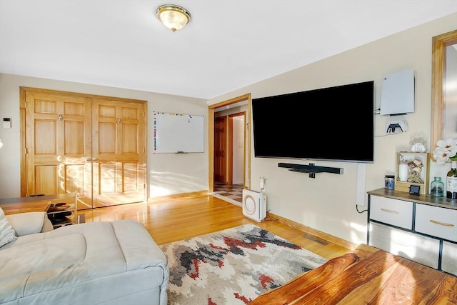 living room with hardwood / wood-style flooring