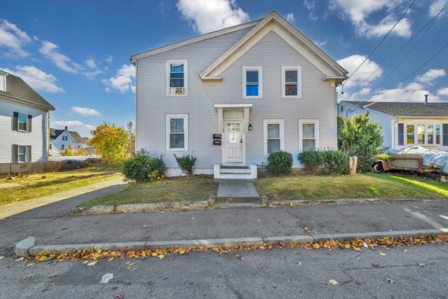 view of front facade featuring a front lawn