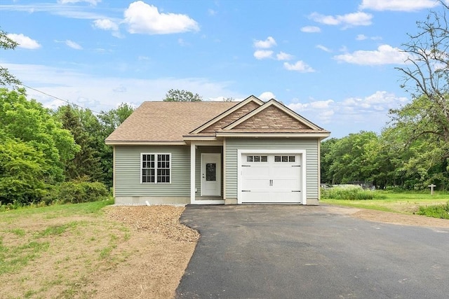 572 Pleasant St, Athol, MA 01331 - view of front of property featuring driveway and an attached garage