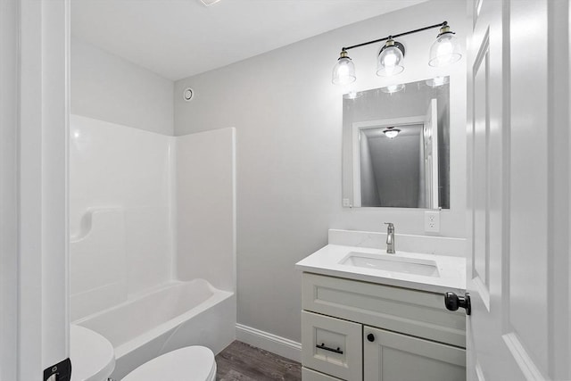572 Pleasant St, Athol, MA 01331 - bathroom with vanity, wood finished floors, and shower / bath combination