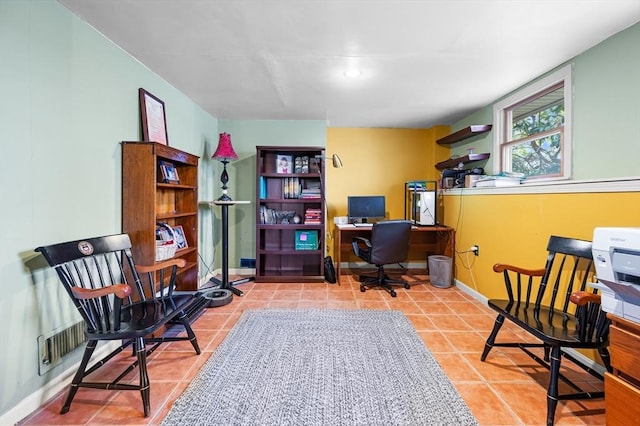 tiled home office featuring baseboards