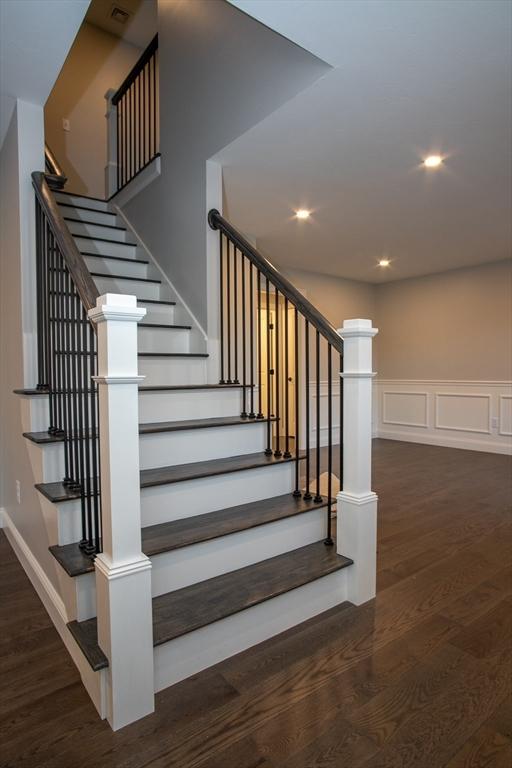 789 Royalston Rd, Phillipston, MA 01331 - staircase with wood finished floors, a wainscoted wall, recessed lighting, and a decorative wall