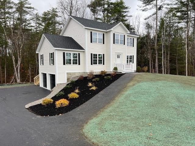 789 Royalston Rd, Phillipston, MA 01331 - colonial inspired home with asphalt driveway and an attached garage