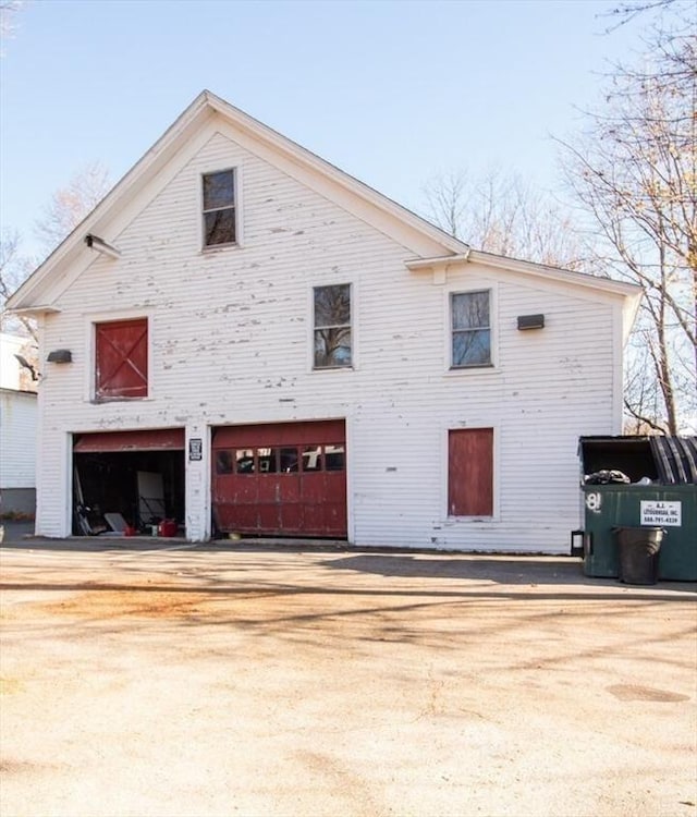 exterior space with a garage