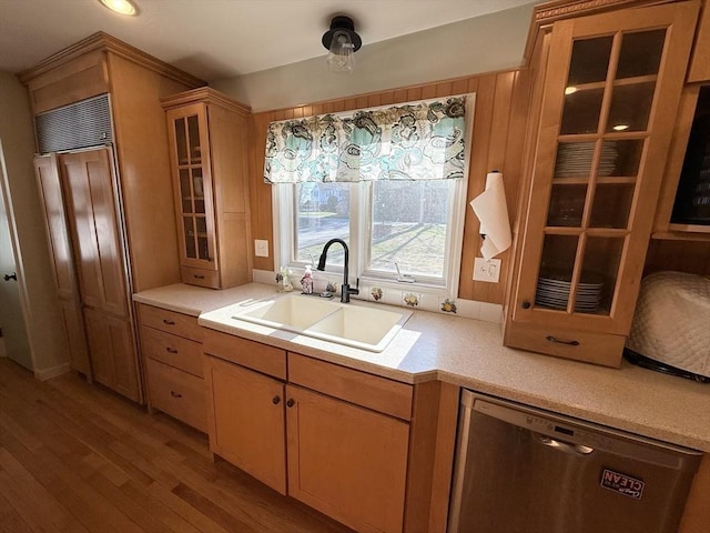 74 Fiske Hill Rd, Sturbridge, MA 01566 - kitchen with dishwasher, a sink, light wood-type flooring, light countertops, and glass insert cabinets